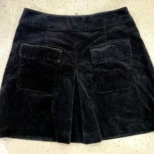 Urban Outfitters corduroy mini skirt. Never worn. Size medium.